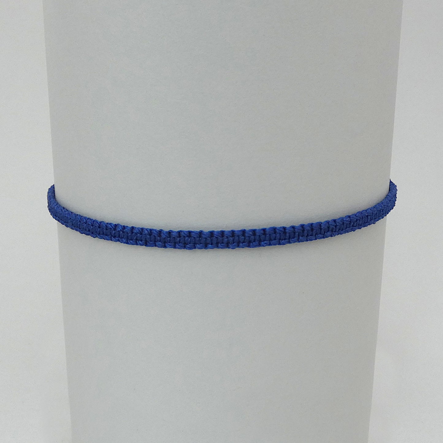 7” adjustable Royal blue coloured macramé bracelet for adults with silver plated bead ends.