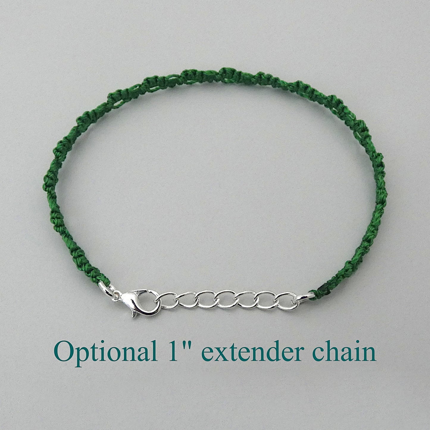 Christmas green macramé bracelet tied with an intricate lace effect with silver plated clasp and optional 1” extender chain.