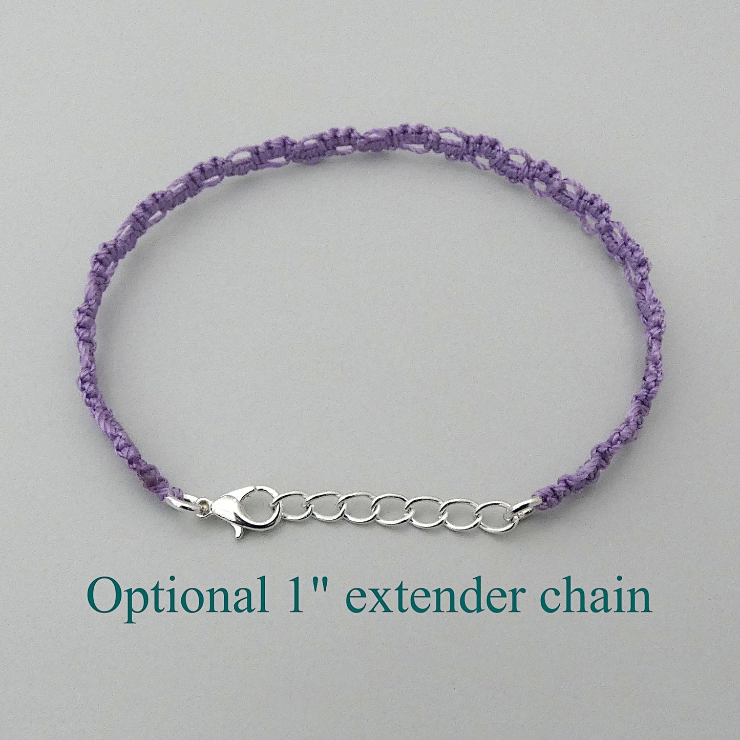 Orchid purple macramé bracelet tied with an intricate lace effect with silver plated clasp and optional 1” extender chain.